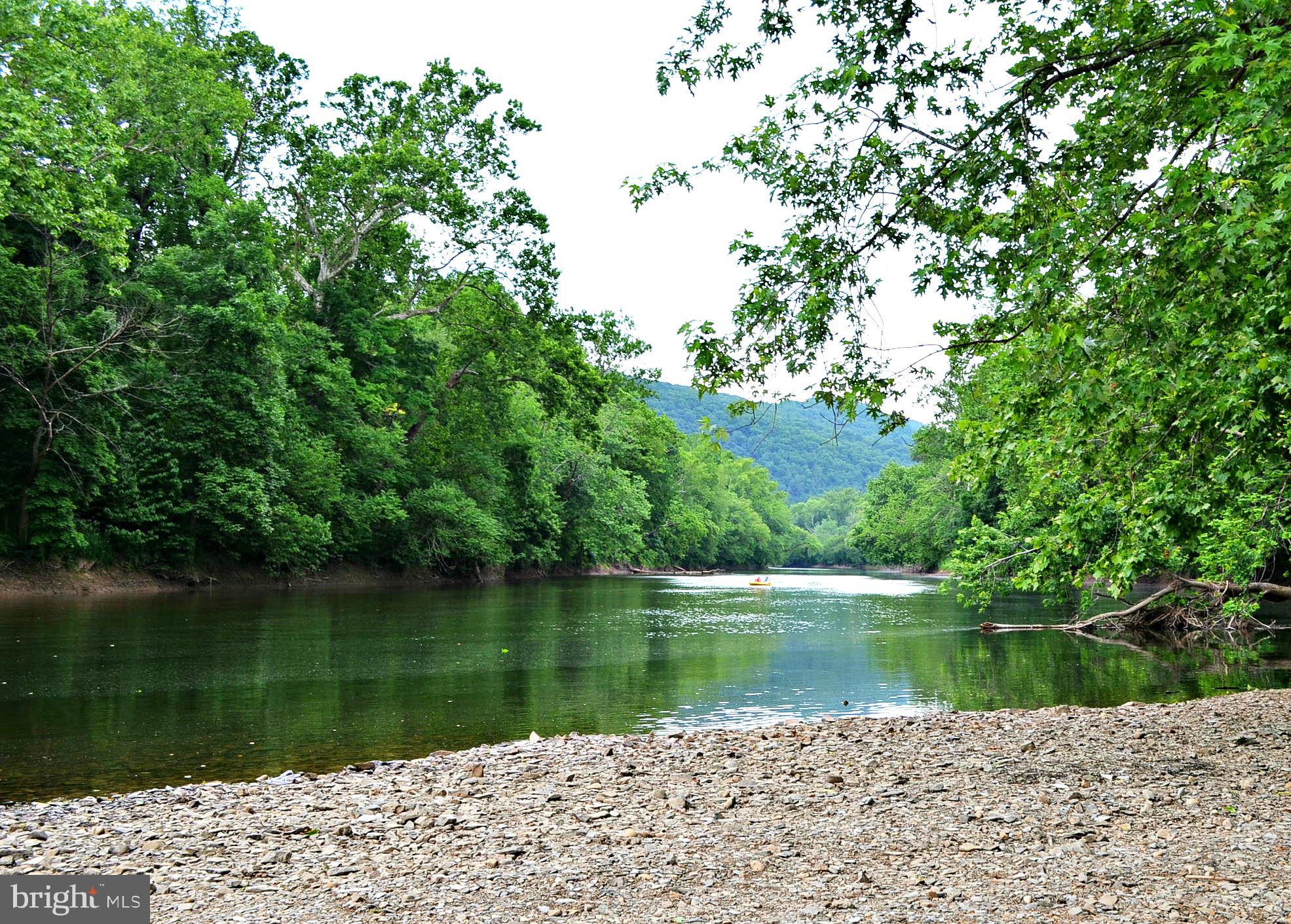 2910 Milo School Road Great Cacapon, WV 25422 - Photo 4 of 55 a view of lake with green space