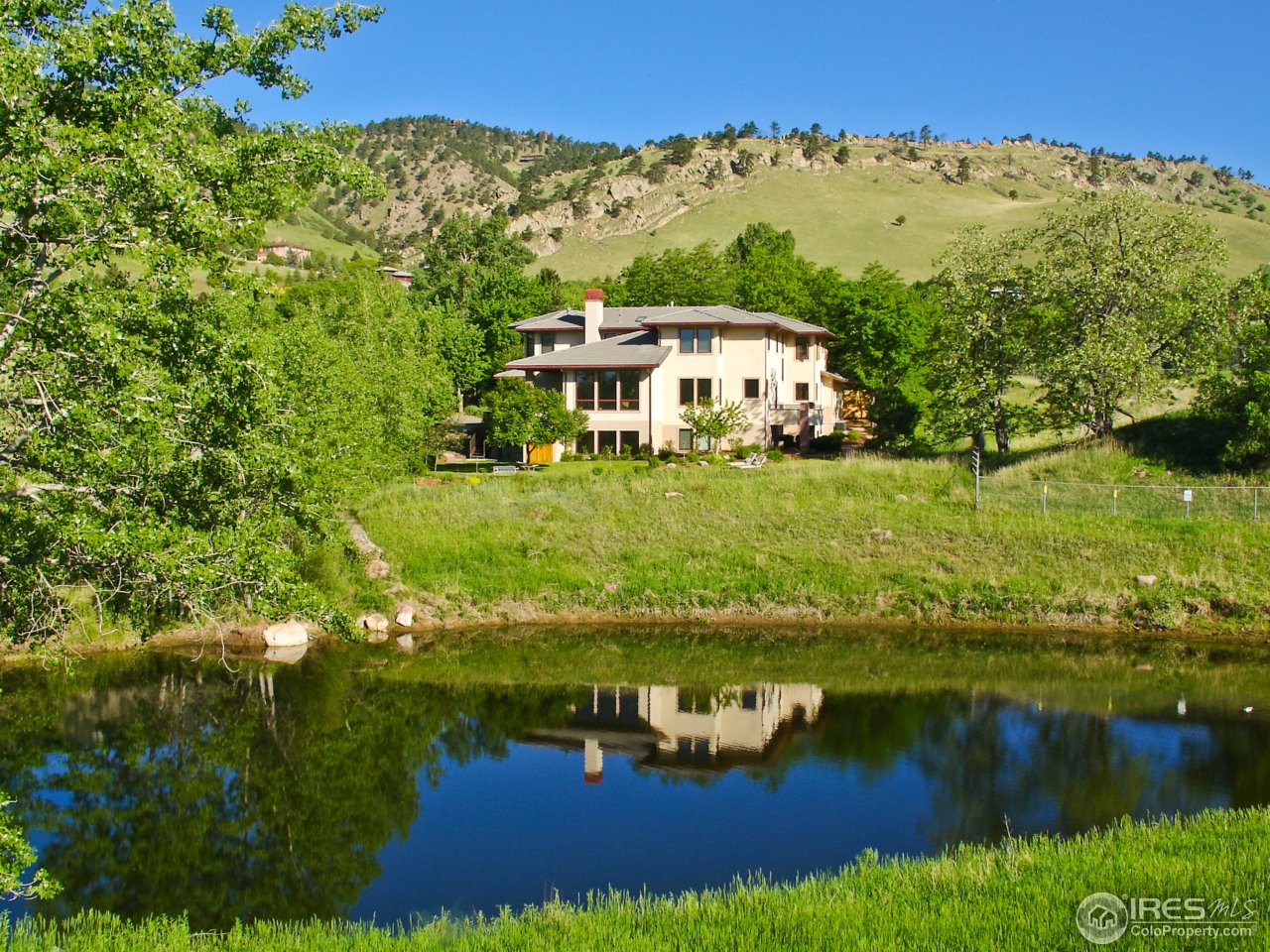 a view of a lake with a mountain in the background