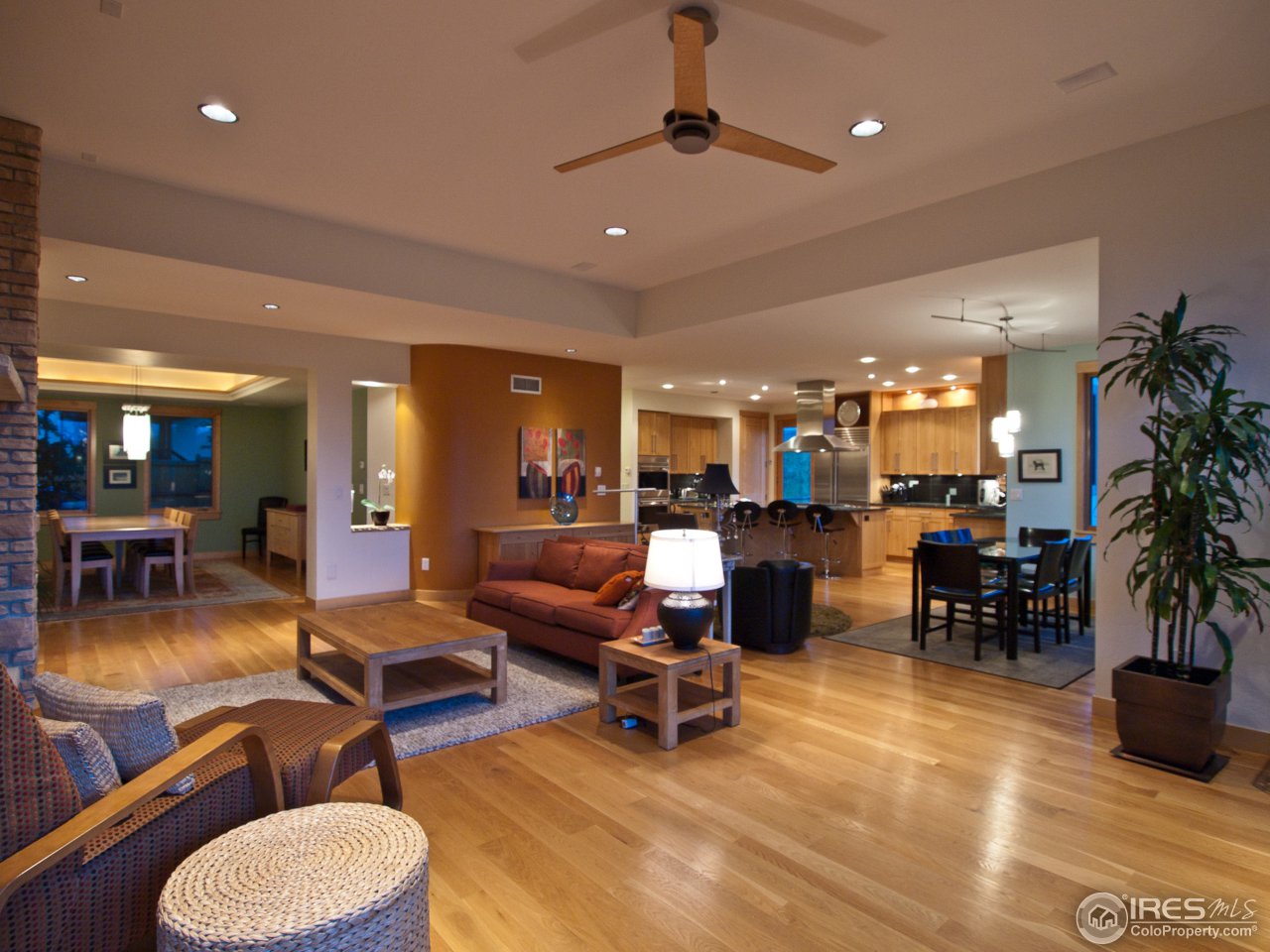 3718 Spring Valley Road Boulder, CO 80304 - Photo 25 of 25 a living room with furniture a dining table and chairs