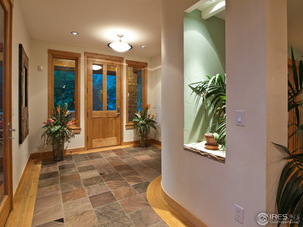 3718 Spring Valley Road Boulder, CO 80304 - Photo 14 of 25 a view of entryway with flower pots