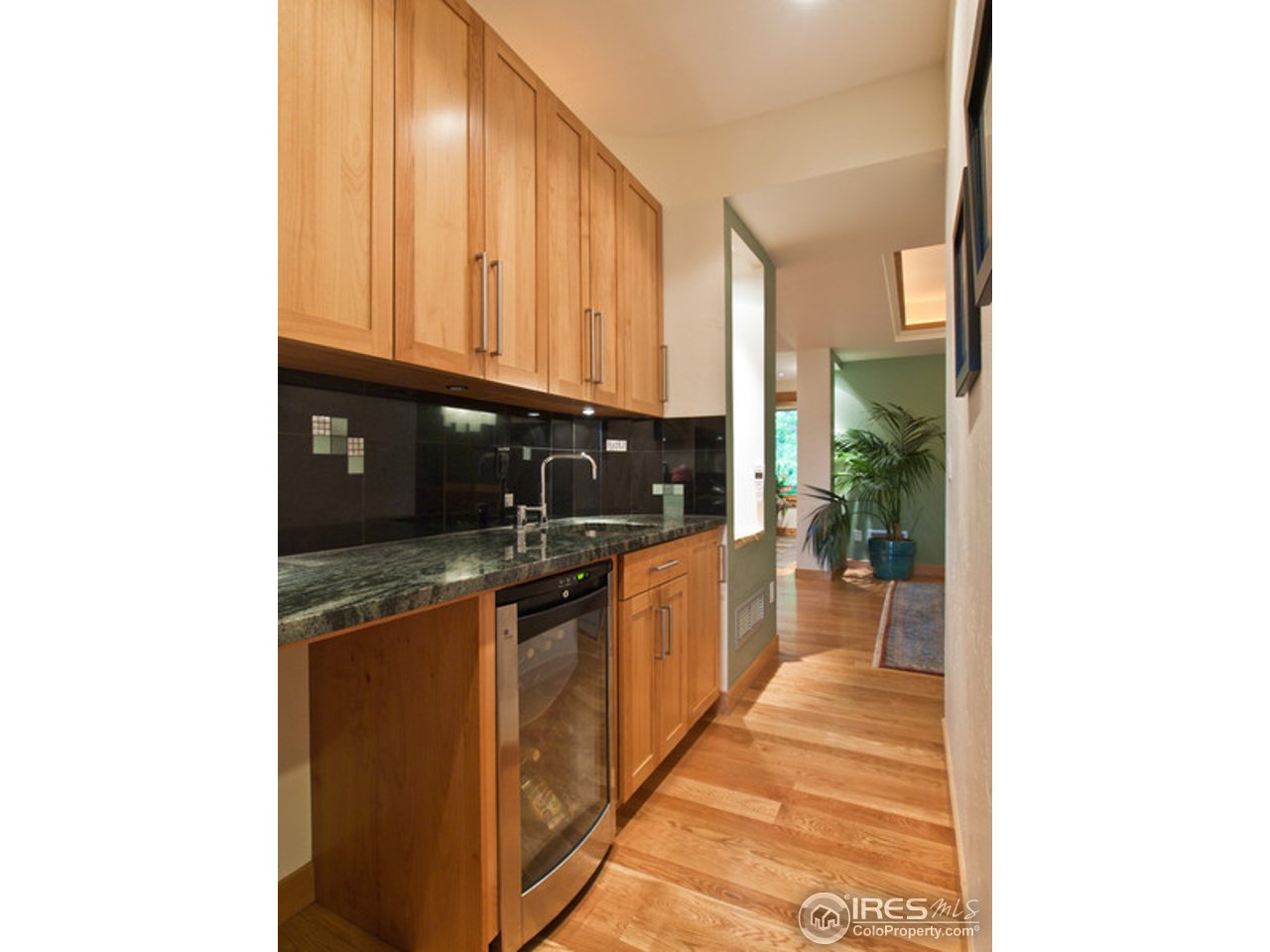3718 Spring Valley Road Boulder, CO 80304 - Photo 15 of 25 a view of a kitchen with stainless steel appliances granite countertop a sink and cabinets