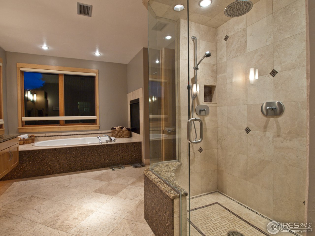 3718 Spring Valley Road Boulder, CO 80304 - Photo 18 of 25 a bathroom with a large tub a shower and view