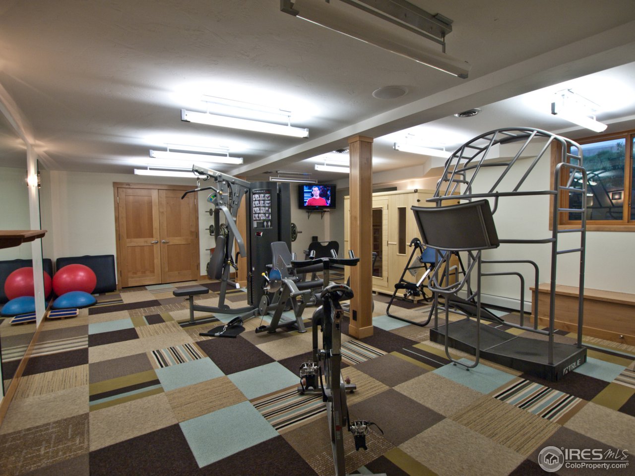 3718 Spring Valley Road Boulder, CO 80304 - Photo 19 of 25 a view of a room with gym equipment
