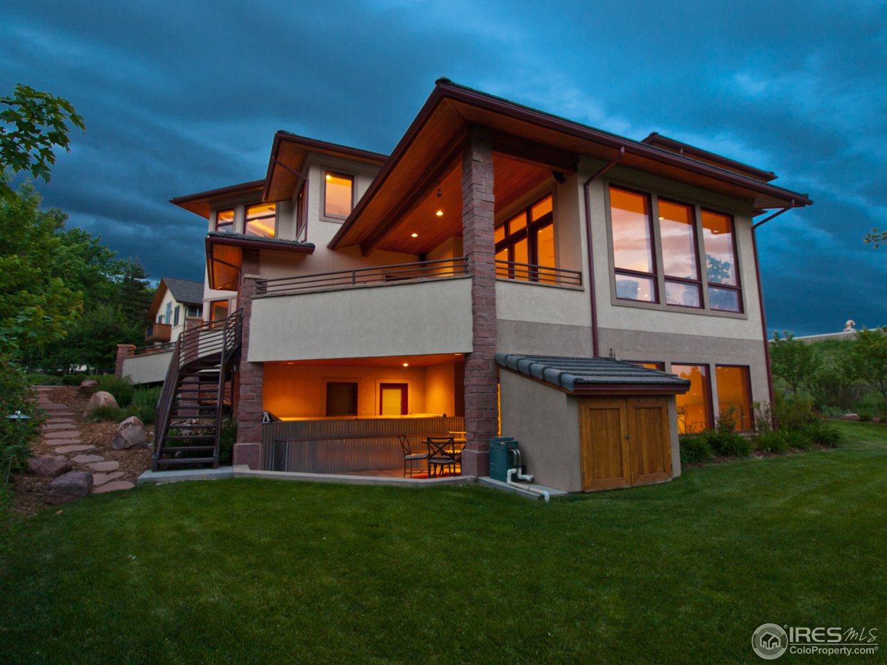 3718 Spring Valley Road Boulder, CO 80304 - Photo 2 of 25 a front view of a house with a yard