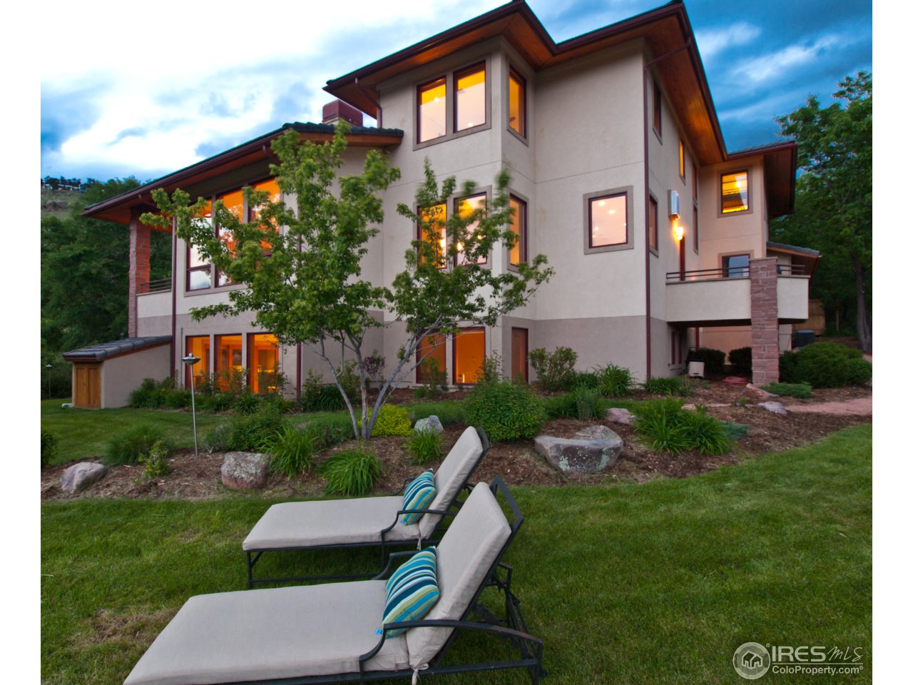 3718 Spring Valley Road Boulder, CO 80304 - Photo 3 of 25 a front view of a house with a yard