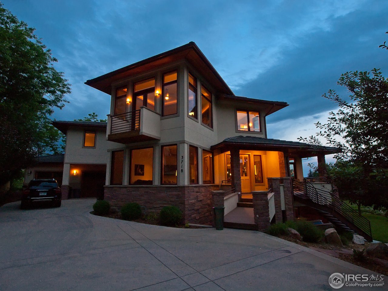 3718 Spring Valley Road Boulder, CO 80304 - Photo 4 of 25 a front view of a house with a yard