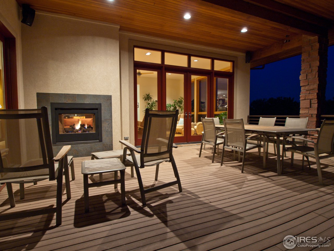 3718 Spring Valley Road Boulder, CO 80304 - Photo 6 of 25 a view of a dinning tables and chairs in the balcony