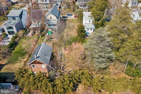 an aerial view of residential house with parking space