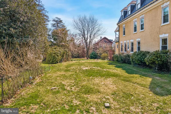 a view of a yard in front of a building