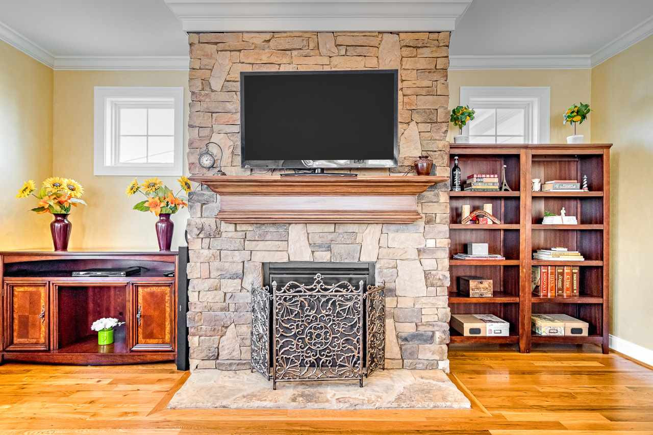 304 Redhill Road Holly Springs, NC 27540 - Photo 10 of 30 Stone Fireplace