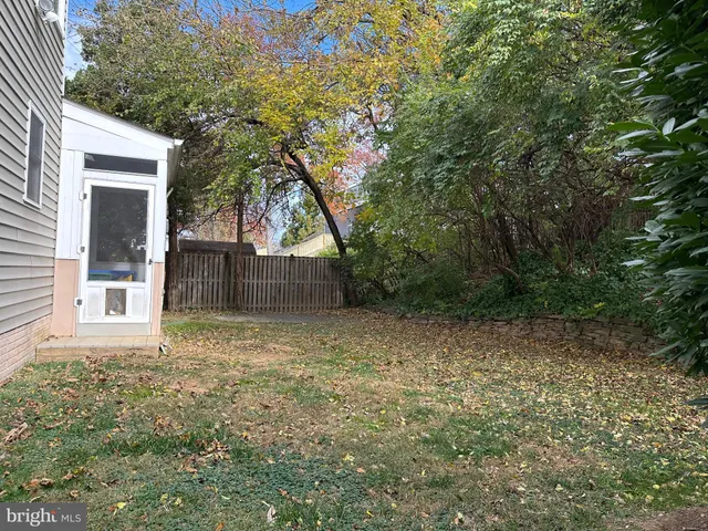 a view of a house with a tree