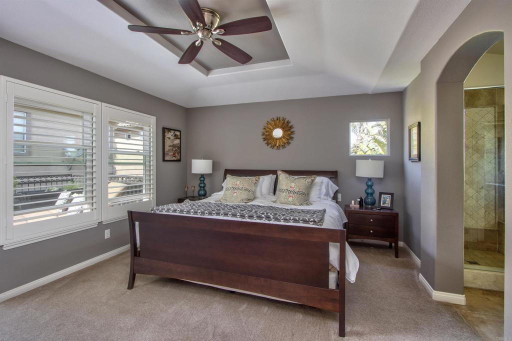 1684 Robin Place Carlsbad, CA 92011 - Photo 15 of 24 a spacious bedroom with a bed and a window