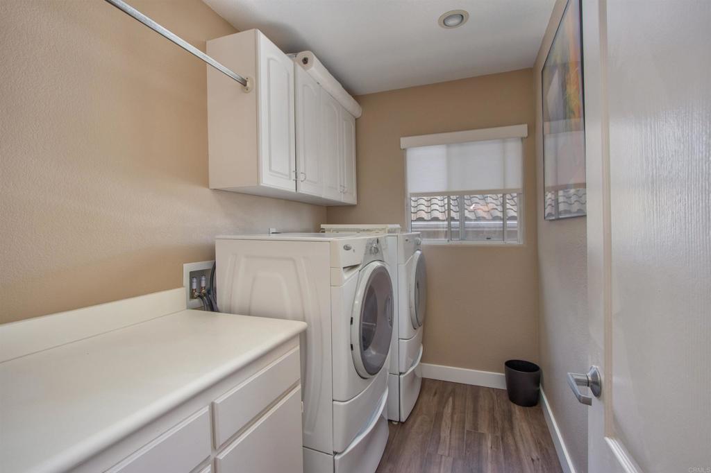 1684 Robin Place Carlsbad, CA 92011 - Photo 22 of 24 a utility room with dryer and washer