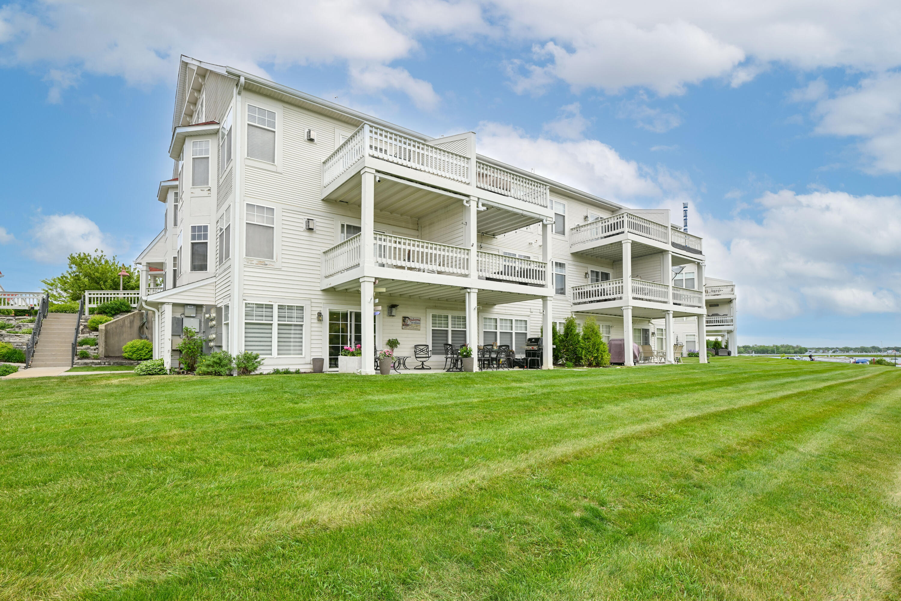 2126 Landings Lane Delavan, WI 53115 - Photo 28 of 47 View of Condo From Lakeside