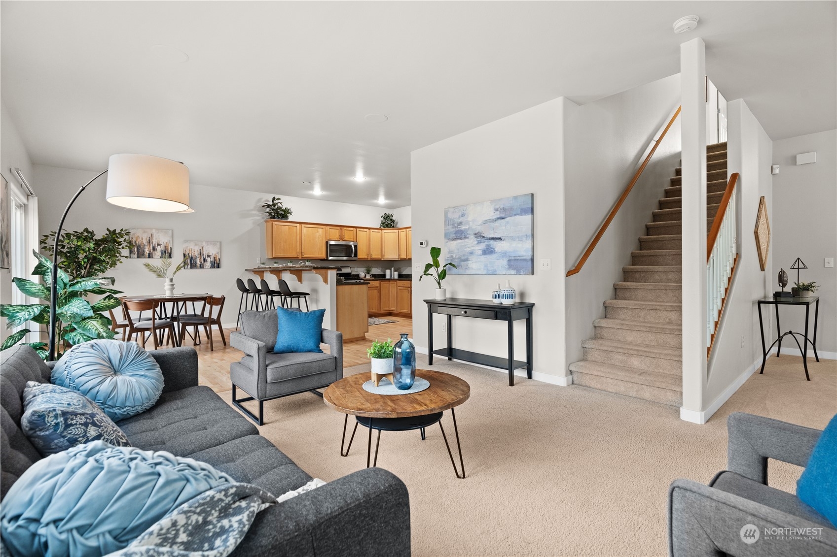 1012 186th Street Southeast Bothell, WA 98012 - Photo 12 of 40 a living room with furniture and wooden floor