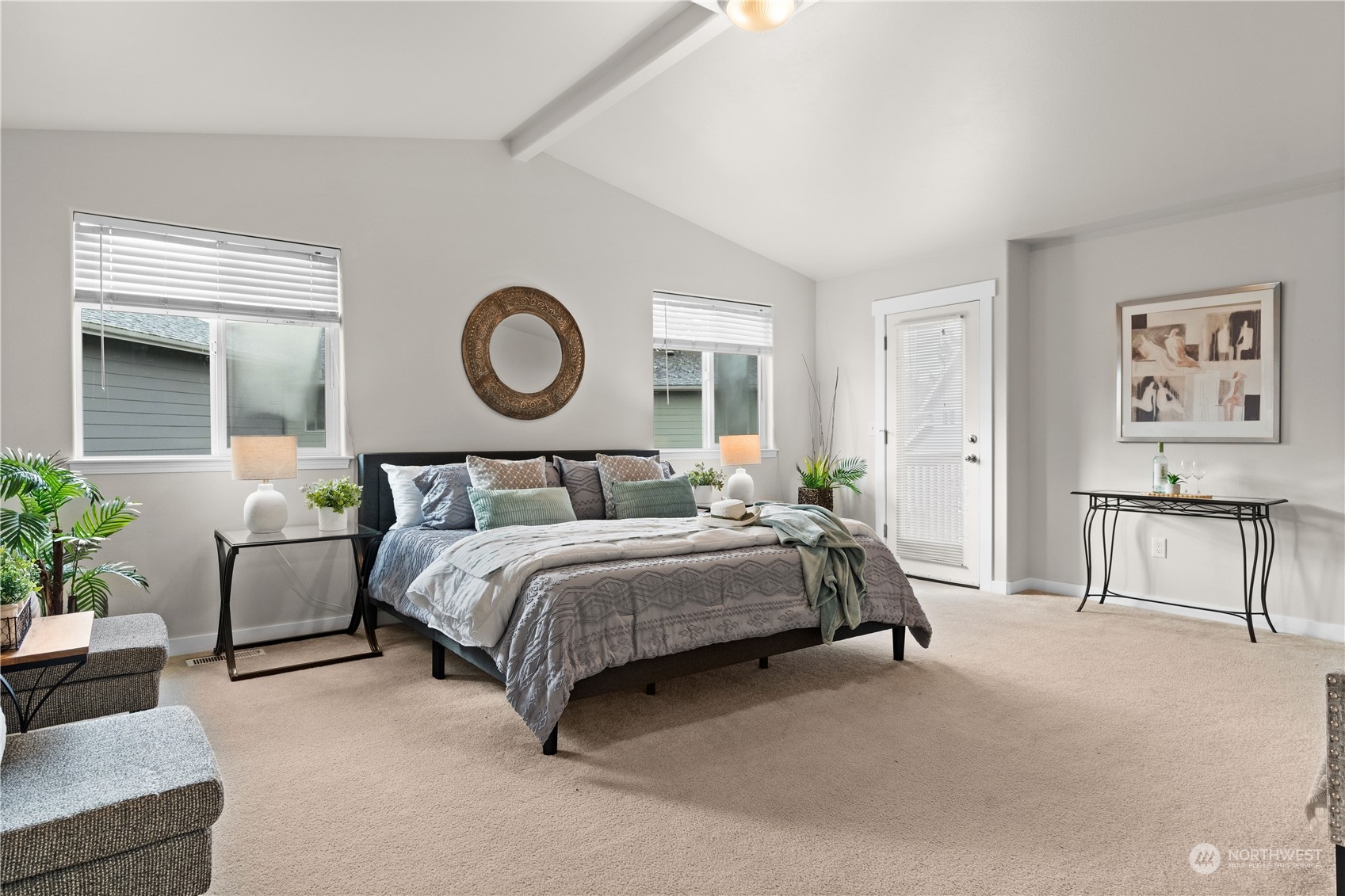 1012 186th Street Southeast Bothell, WA 98012 - Photo 17 of 40 a bedroom with bed and a potted plant