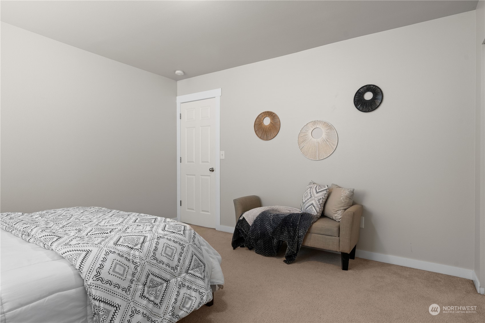 1012 186th Street Southeast Bothell, WA 98012 - Photo 22 of 40 a bedroom with a bed and a lamp