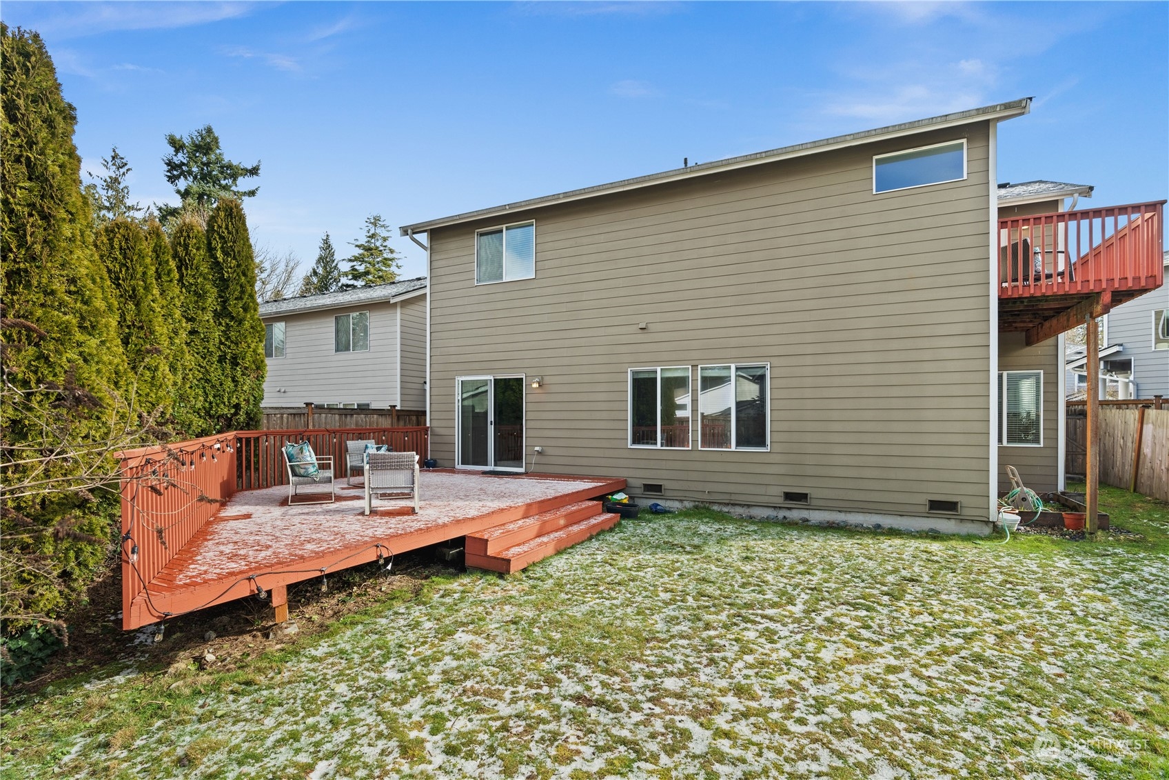 1012 186th Street Southeast Bothell, WA 98012 - Photo 24 of 40 a backyard of a house with seating space
