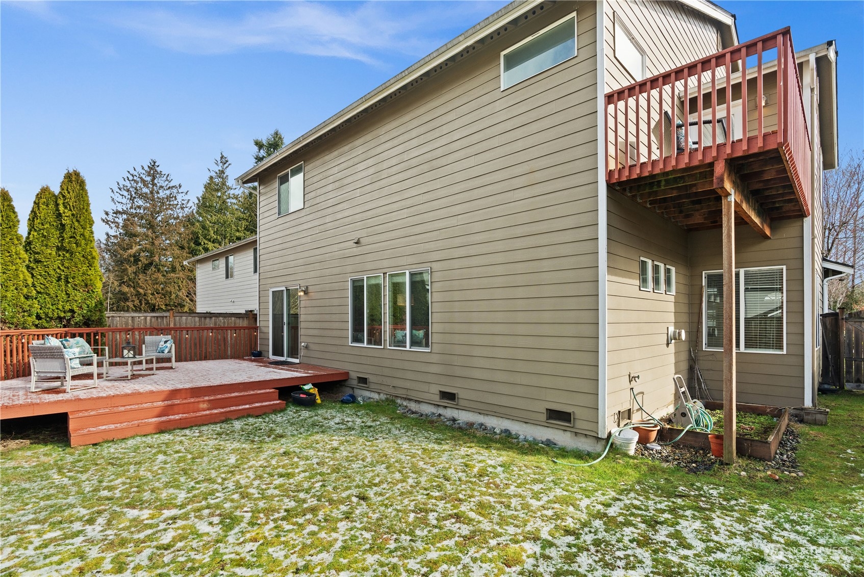 1012 186th Street Southeast Bothell, WA 98012 - Photo 25 of 40 a backyard of a house with seating space