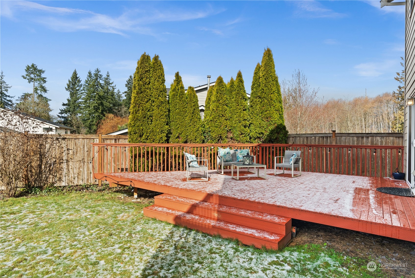 1012 186th Street Southeast Bothell, WA 98012 - Photo 27 of 40 a view of a chairs and table on the wooden floor