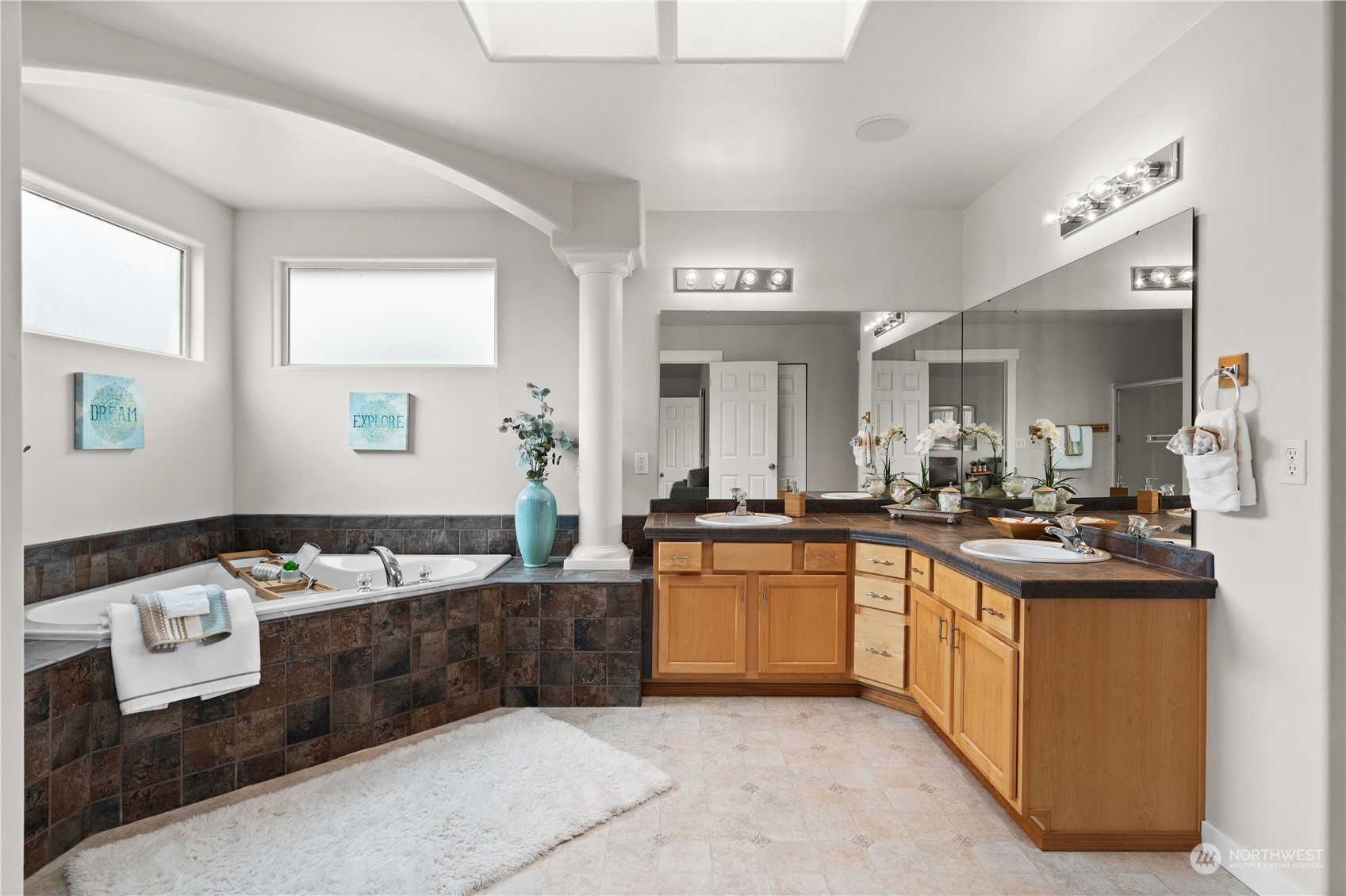 1012 186th Street Southeast Bothell, WA 98012 - Photo 29 of 40 a kitchen with stainless steel appliances granite countertop a sink and a stove
