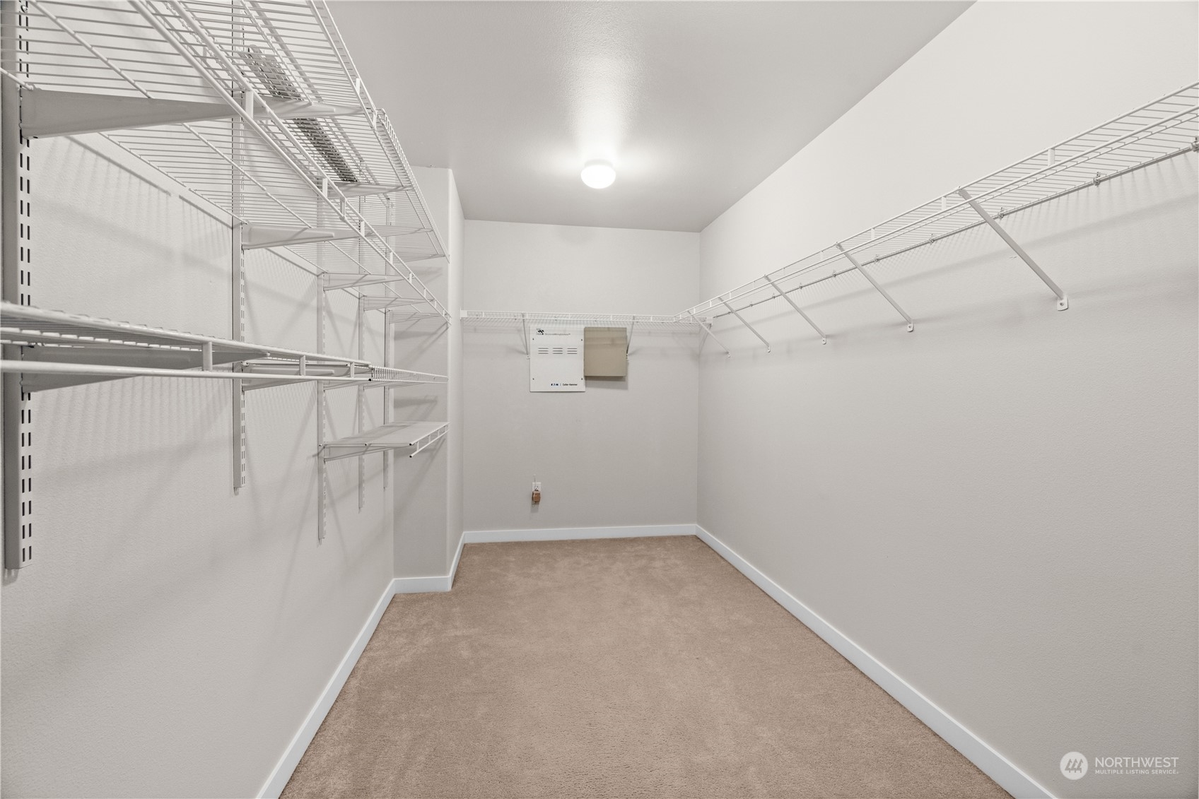 1012 186th Street Southeast Bothell, WA 98012 - Photo 31 of 40 a view of a room with racks on the wall