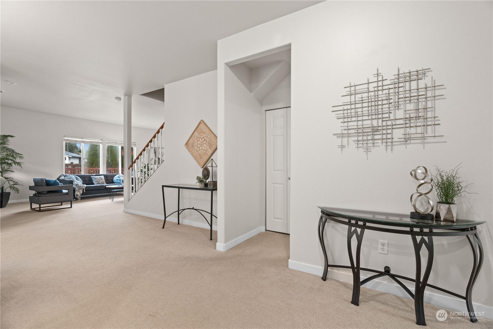 1012 186th Street Southeast Bothell, WA 98012 - Photo 34 of 40 a view of a livingroom with furniture and a ceiling fan
