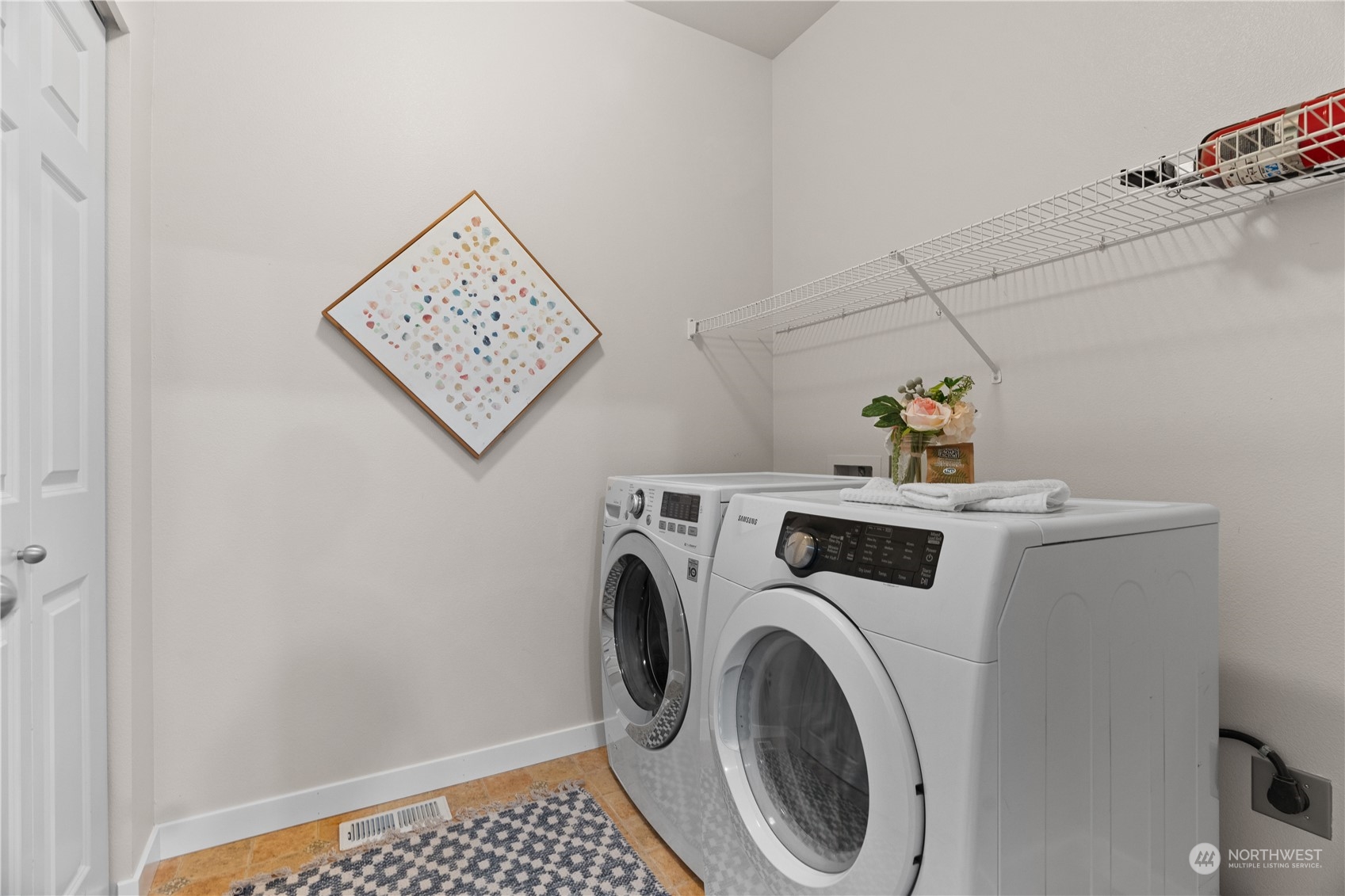 1012 186th Street Southeast Bothell, WA 98012 - Photo 35 of 40 a view of storage and utility room with washer and dryer