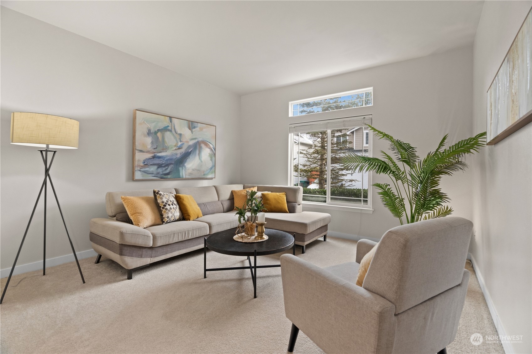 1012 186th Street Southeast Bothell, WA 98012 - Photo 5 of 40 a living room with furniture and a large window