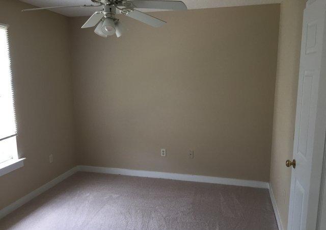 140 Mallet Bayou Road Freeport, FL 32439 - Photo 4 of 20 a view of an empty room with a window