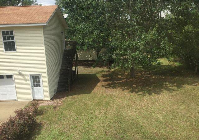 140 Mallet Bayou Road Freeport, FL 32439 - Photo 7 of 20 a view of a backyard