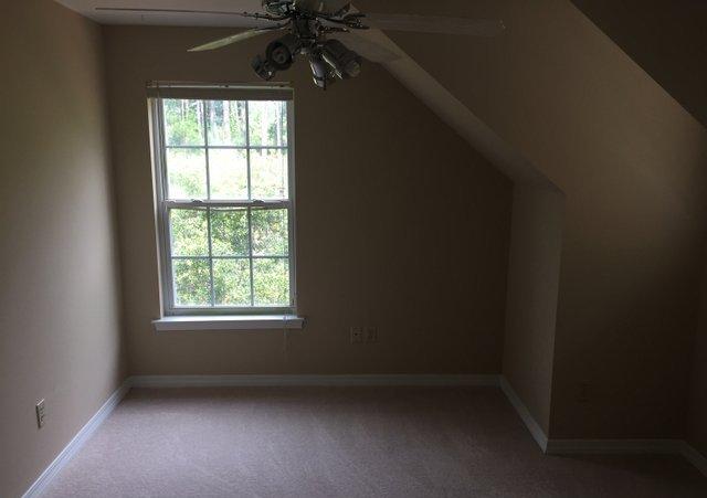 140 Mallet Bayou Road Freeport, FL 32439 - Photo 10 of 20 an empty room with a window