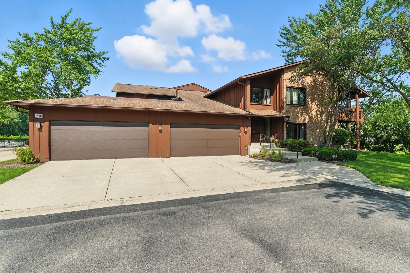 front view of a house with a garage