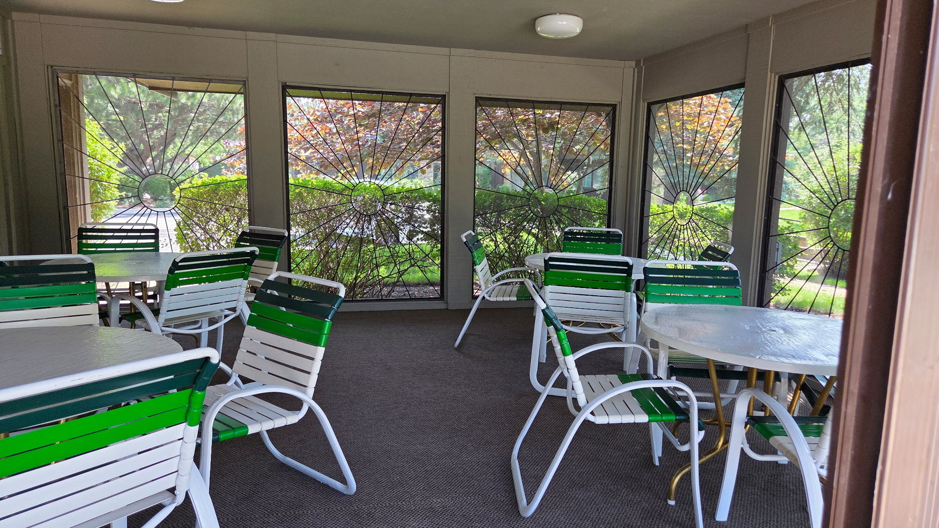 1415 Chartres Drive, Unit 1F Northbrook, IL 60062 - Photo 29 of 35 a view of a patio with a table chairs and a backyard
