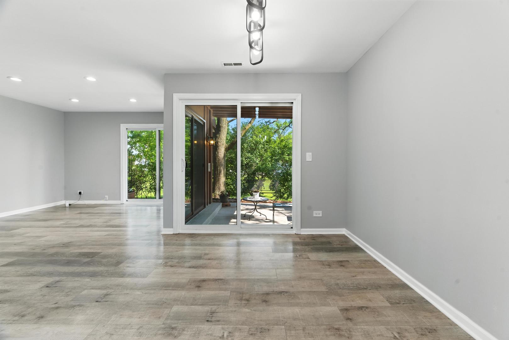 1415 Chartres Drive, Unit 1F Northbrook, IL 60062 - Photo 5 of 35 a view of an entryway with wooden floor