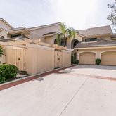 a front view of a house with a garage
