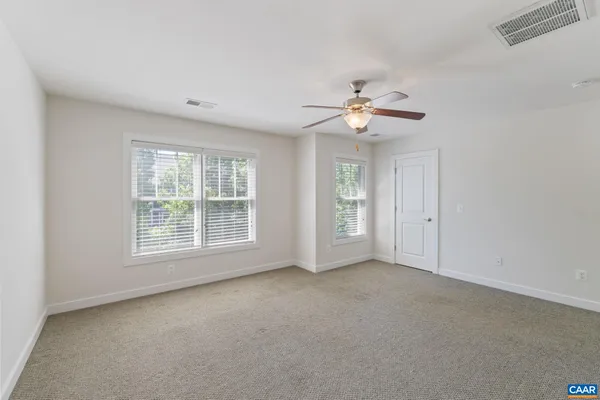 an empty room with a bathroom