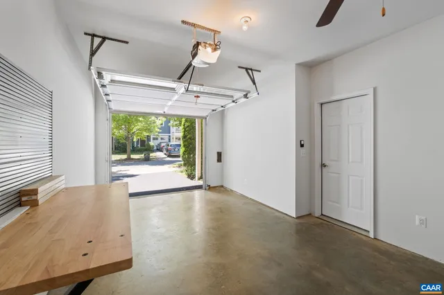 a view of room with a ceiling fan