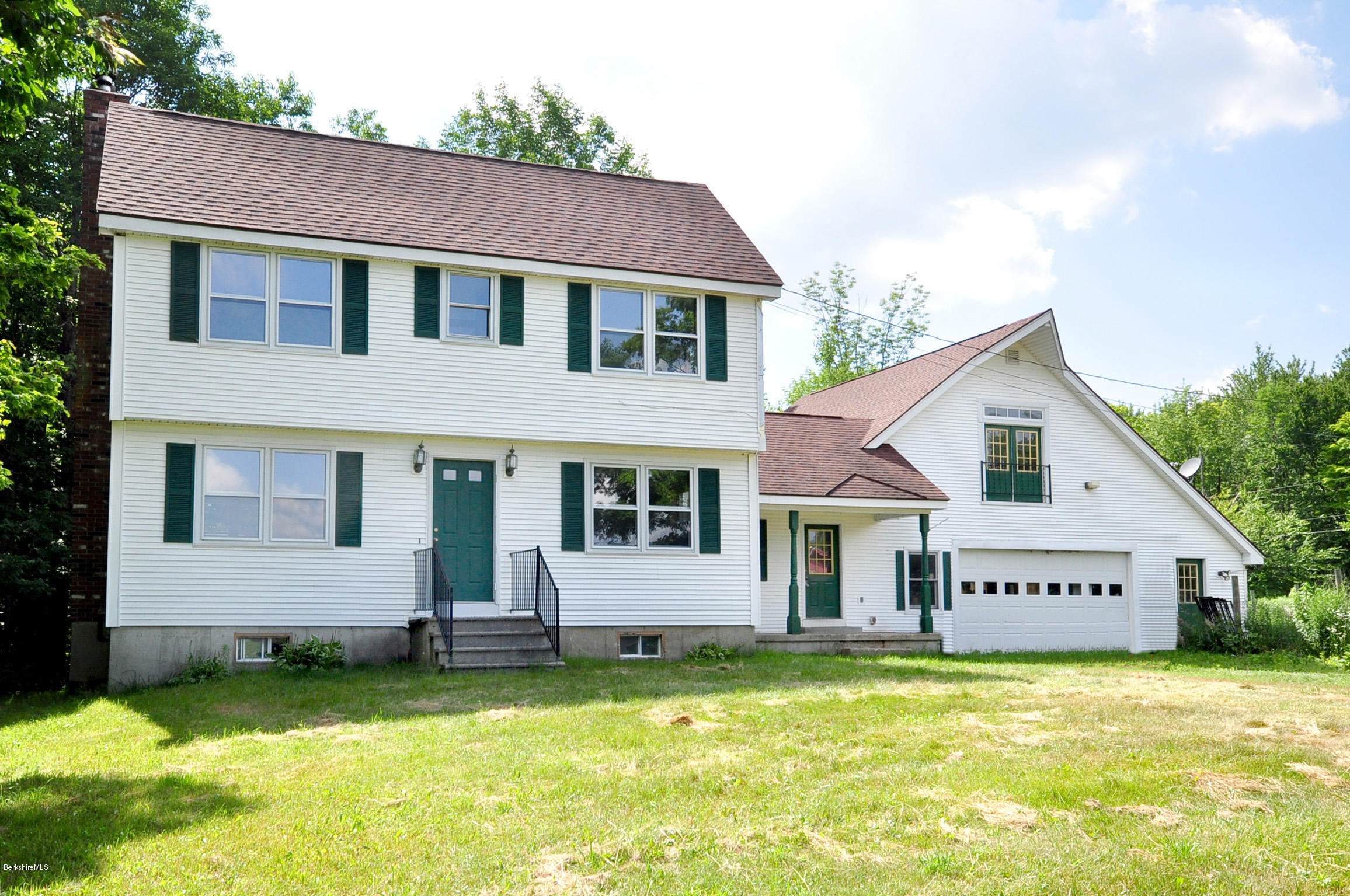 6 Johnnycake Hill Road Chester, MA 01011 - Photo 1 of 43 a view of a house with a yard and swimming pool