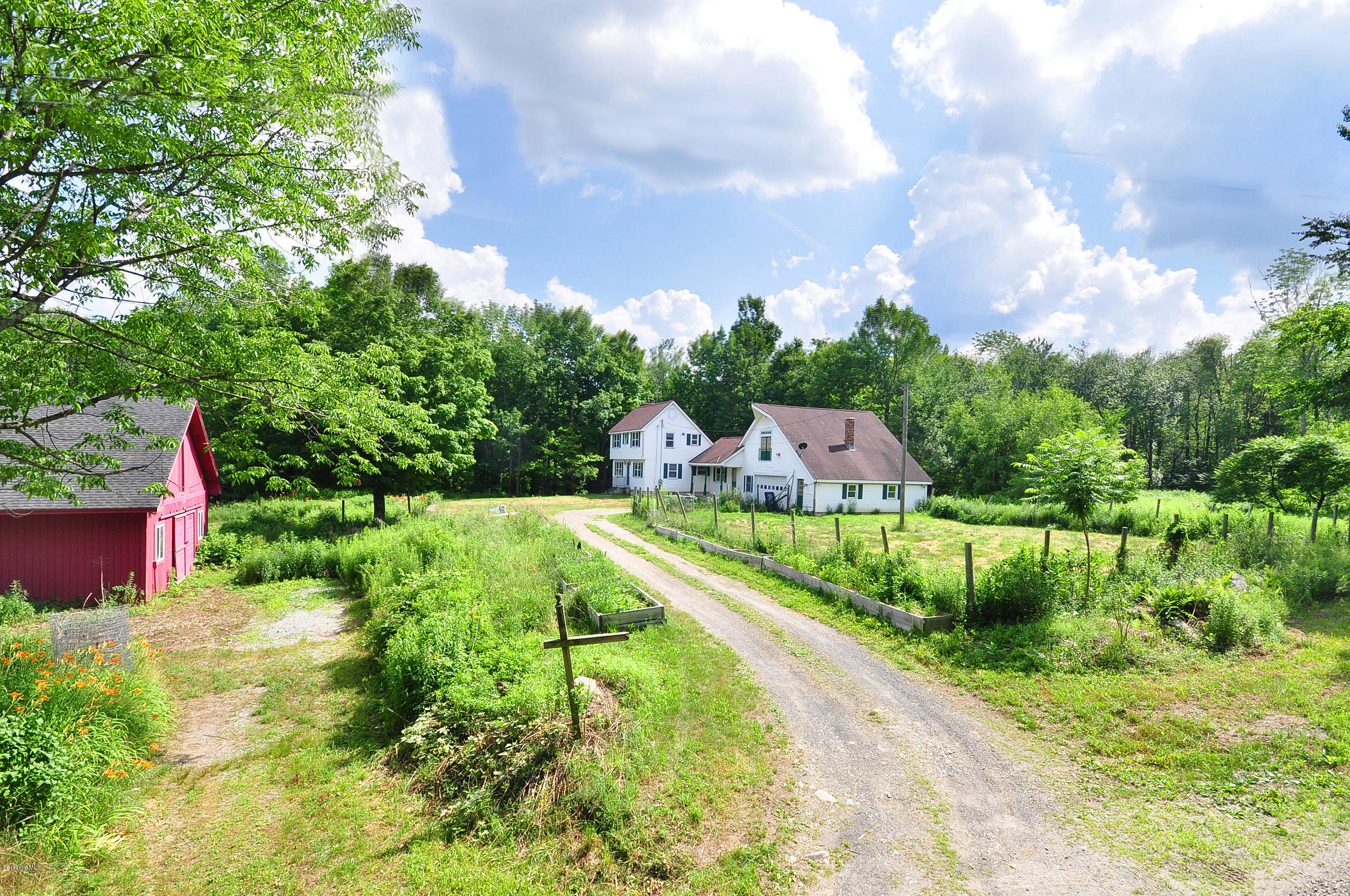 6 Johnnycake Hill Road Chester, MA 01011 - Photo 2 of 43 a view of house with yard and swimming pool
