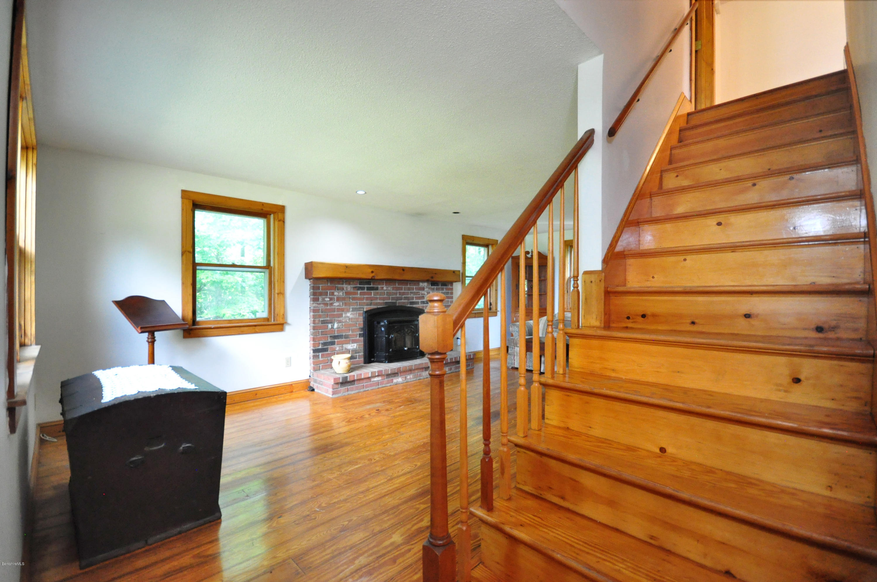 6 Johnnycake Hill Road Chester, MA 01011 - Photo 11 of 43 a living room with furniture and a fireplace
