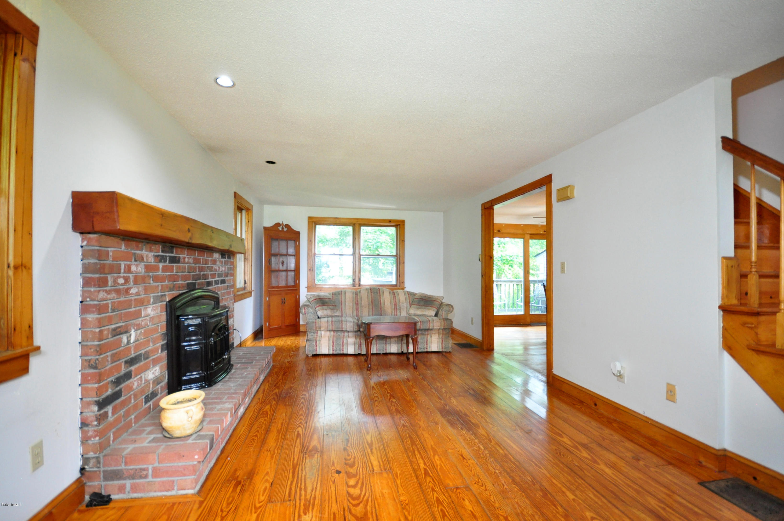 6 Johnnycake Hill Road Chester, MA 01011 - Photo 13 of 43 a living room with furniture and a fireplace
