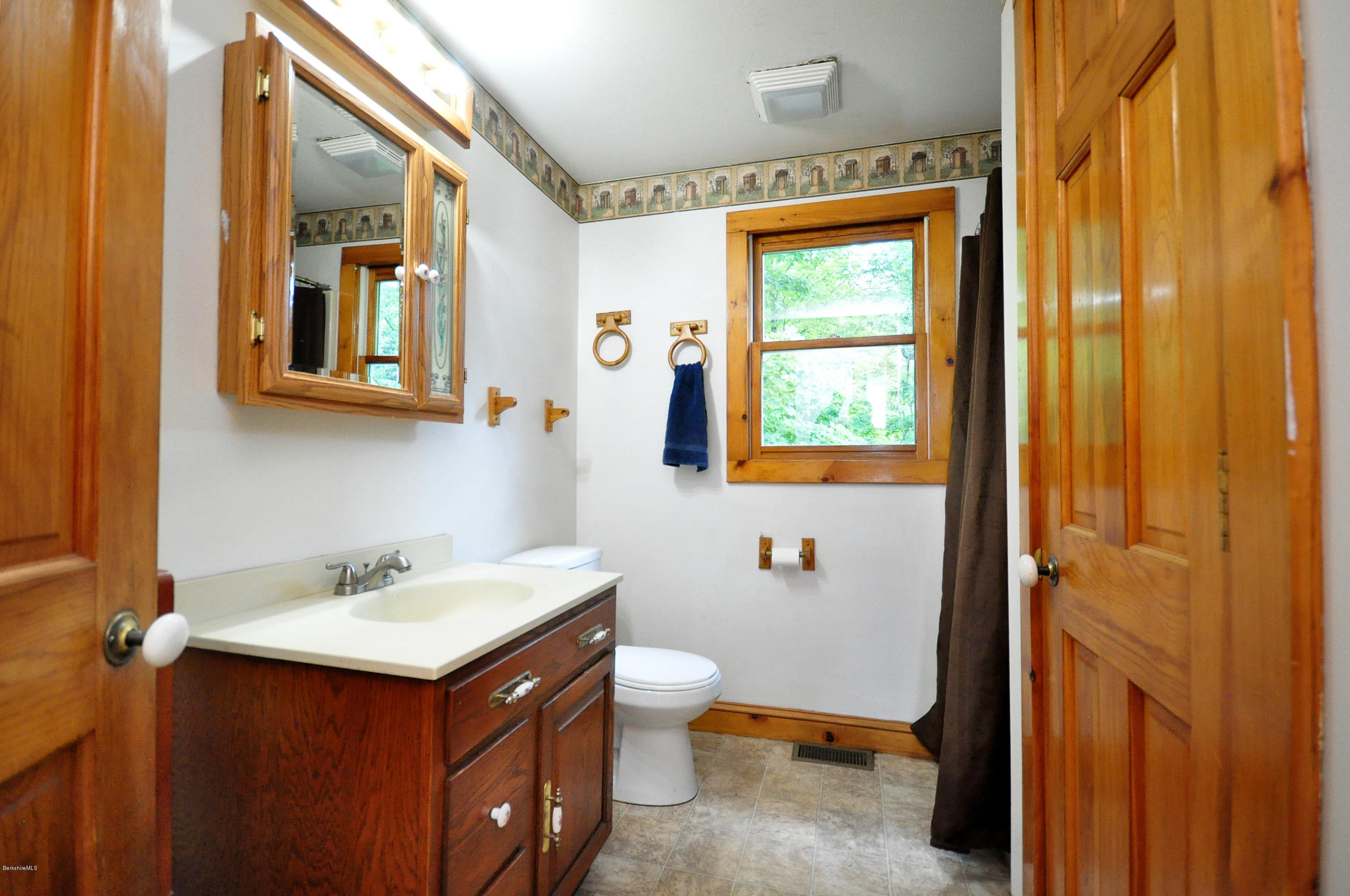 6 Johnnycake Hill Road Chester, MA 01011 - Photo 27 of 43 a bathroom with a sink and a mirror