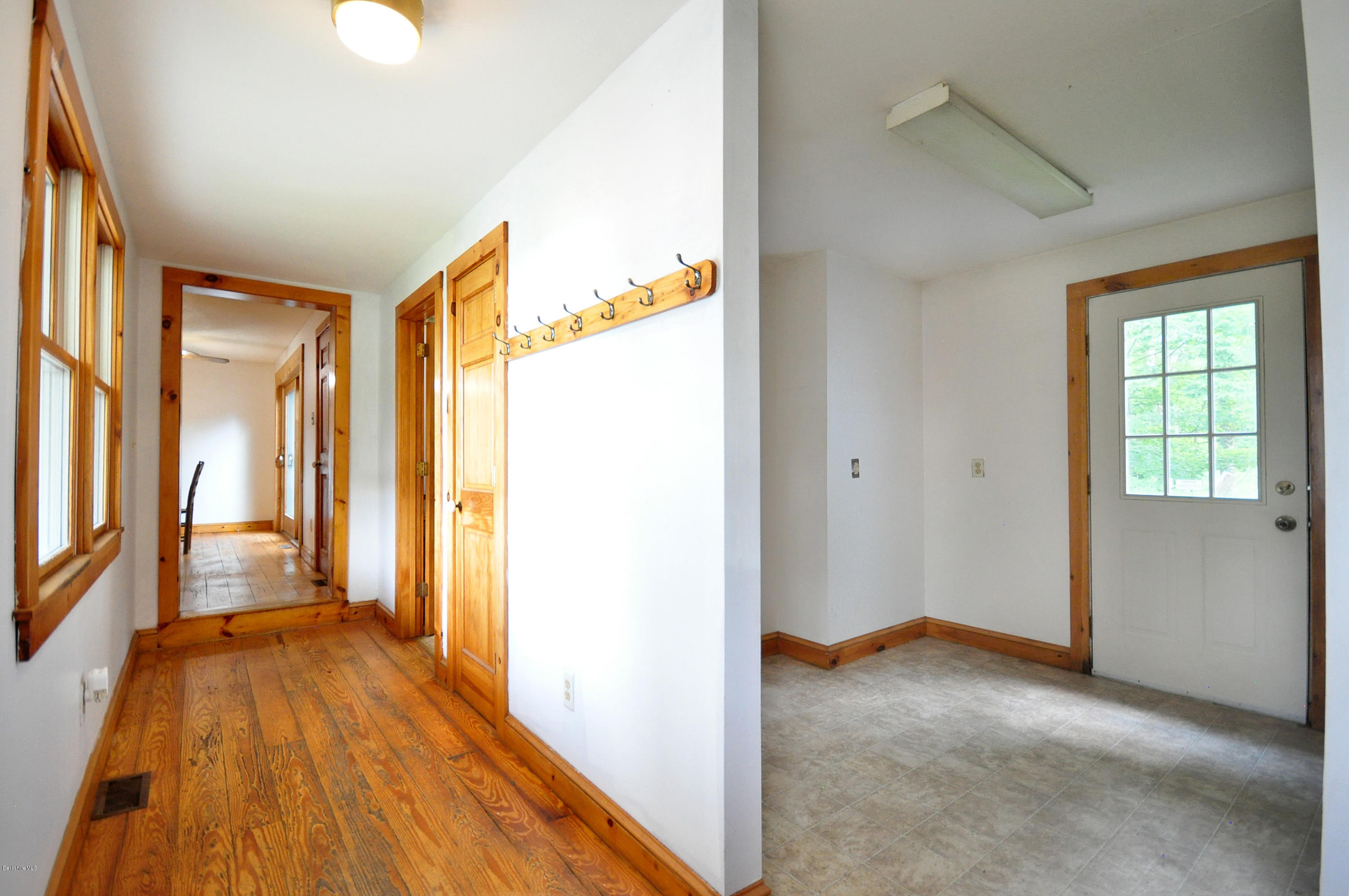 6 Johnnycake Hill Road Chester, MA 01011 - Photo 29 of 43 a view of a hallway with wooden floor and a window