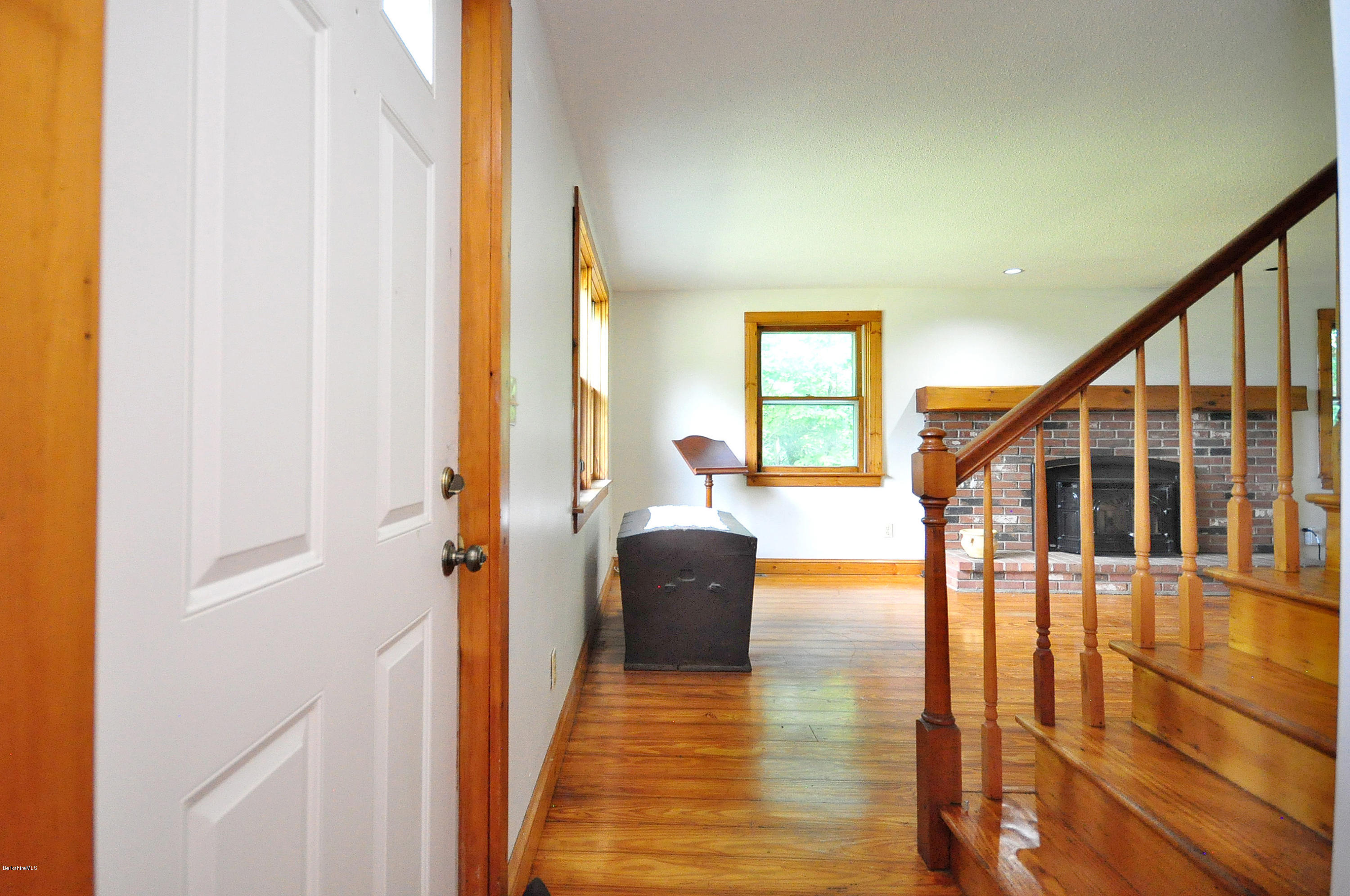 6 Johnnycake Hill Road Chester, MA 01011 - Photo 10 of 43 a view of hallway with wooden floor and windows