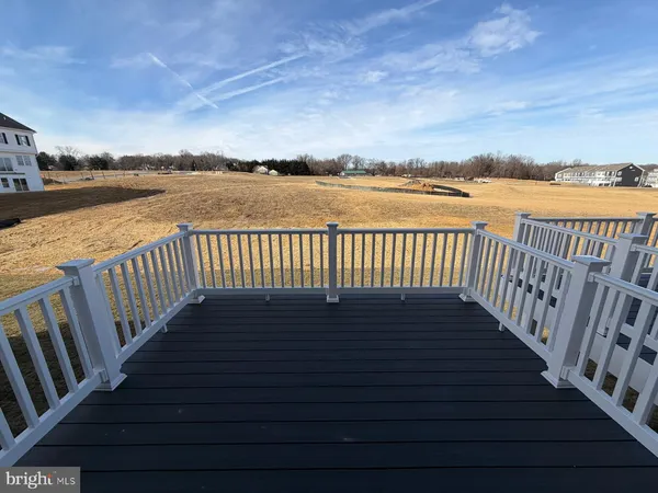 a view of wooden floor with a lake