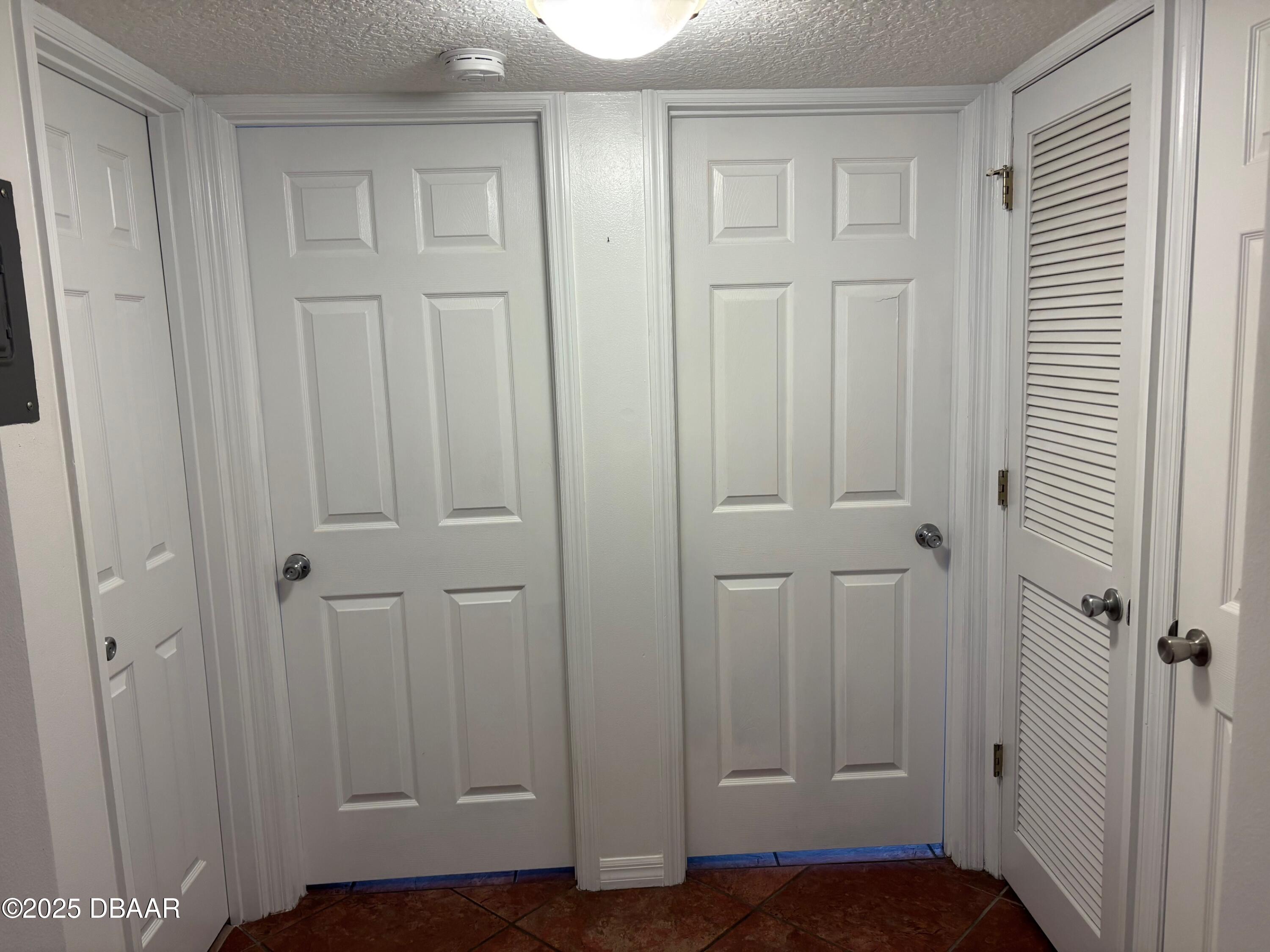3724 South Atlantic Avenue, Unit 4 Daytona Beach, FL 32118 - Photo 4 of 10 an empty room with wooden floor