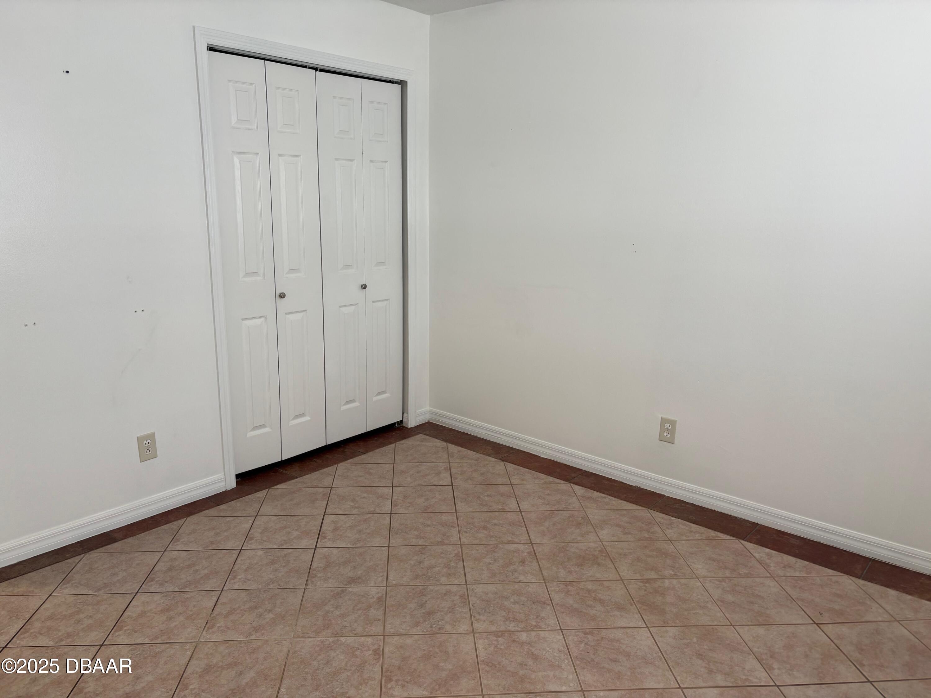 3724 South Atlantic Avenue, Unit 4 Daytona Beach, FL 32118 - Photo 8 of 10 a view of an empty room