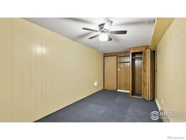 a open hall with a ceiling fan