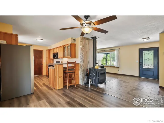 a room with furniture and a large window